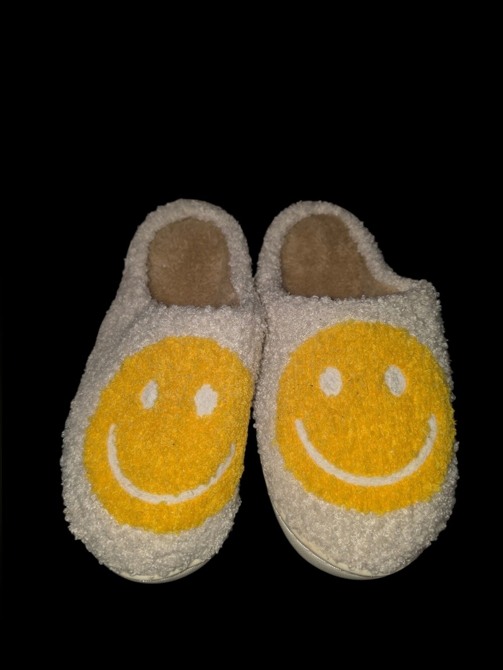 9/2/4. Cozy Smiley Face Slippers